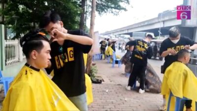 Những bản trẻ cắt tóc miễn phí trên vỉa hè thủ đô